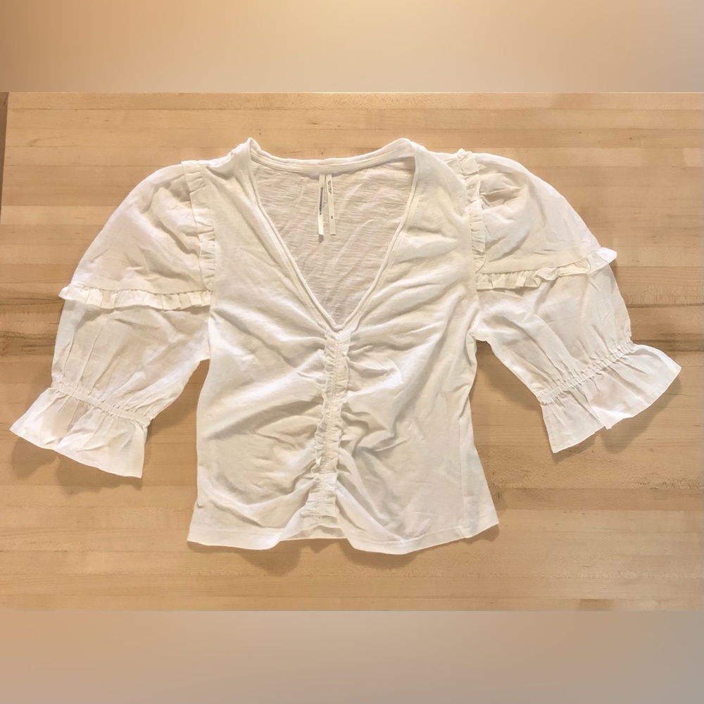 Anthropologie - white puff sleeve crop top with ruffle details